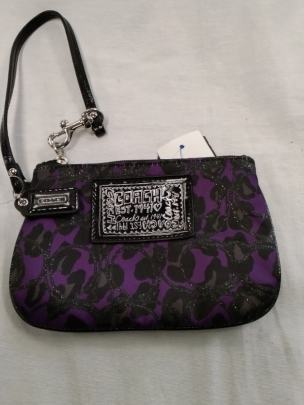 Source Unknown Purple and Black Coach Signature Wristlet